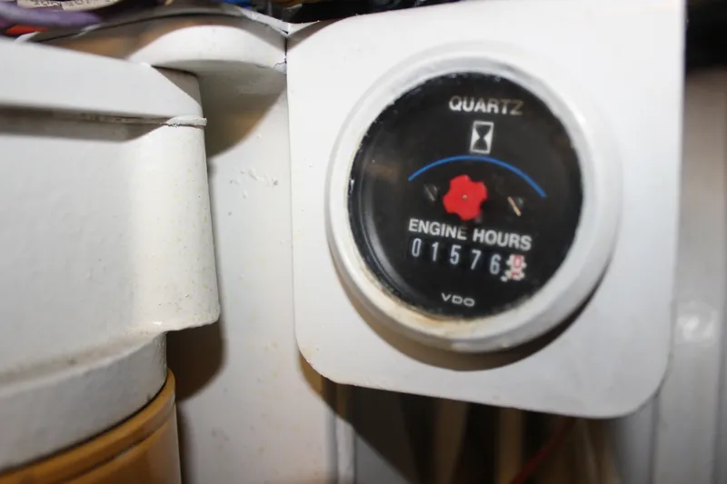 Slide: The Image of Engine hour meter showing 1576 hours on 1989 Californian 55 Cockpit Motor Yacht. - 20