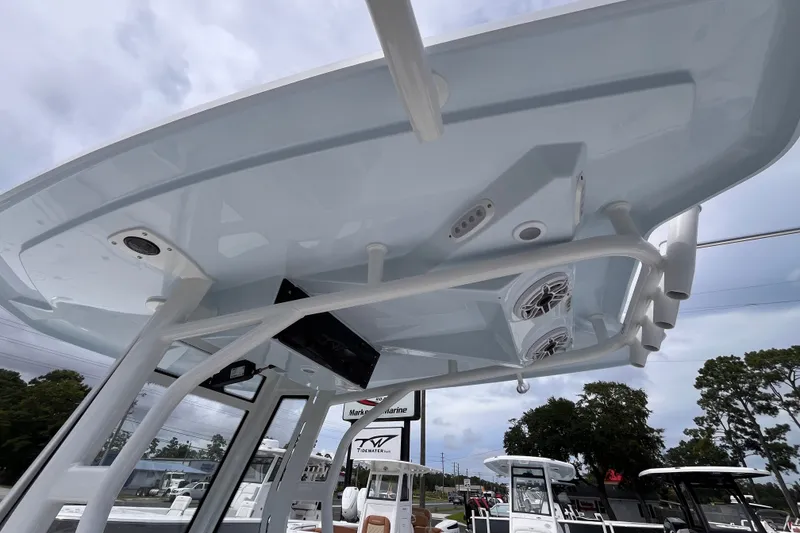 Slide: The Image of Tidewater 2700 Carolina Bay 2027 boat with T-top and speakers, outdoor display. - 17