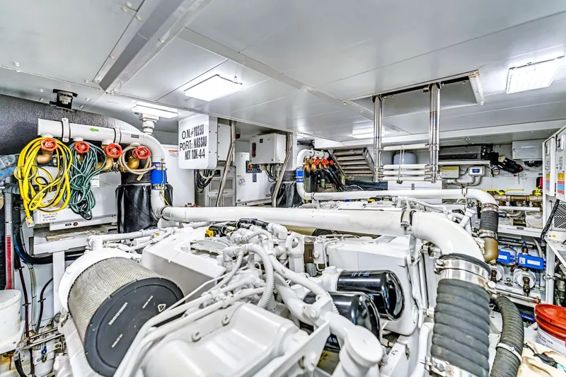 Slide: The Image of Engine room of 2018 Sanlorenzo SL78 yacht, showcasing complex machinery and wiring. - 36