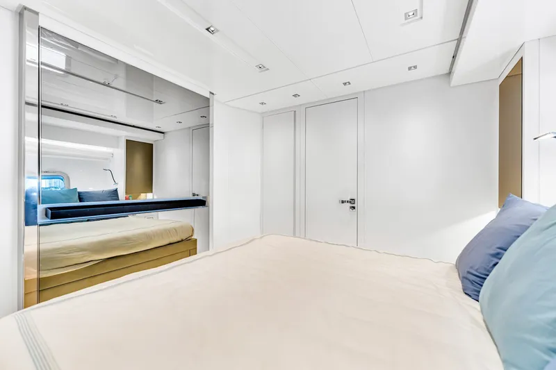 Slide: The Image of Luxurious bedroom interior of 2018 Sanlorenzo SL78 yacht with modern design and elegant furnishings. - 21