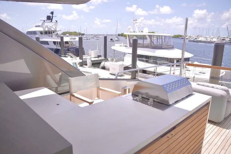 Slide: The Image of Outdoor deck of 2018 Sanlorenzo SL78 yacht with grill and marina view. - 44
