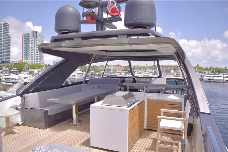 Slide: The Image of Luxurious 2018 Sanlorenzo SL78 yacht with modern outdoor seating and dining area. - 48