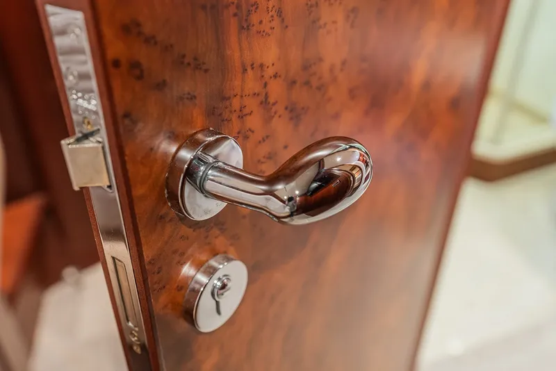Slide: The Image of Polished chrome door handle on Ocean Alexander 65 Pilothouse yacht, 2013 model. - 30