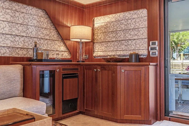 Slide: The Image of Luxurious interior of 2013 Ocean Alexander 65 Pilothouse yacht with elegant wood cabinetry. - 12
