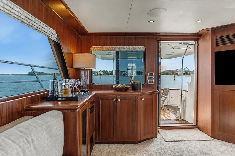 Slide: The Image of Luxurious interior of 2013 Ocean Alexander 65 Pilothouse yacht with elegant wood finishes. - 11