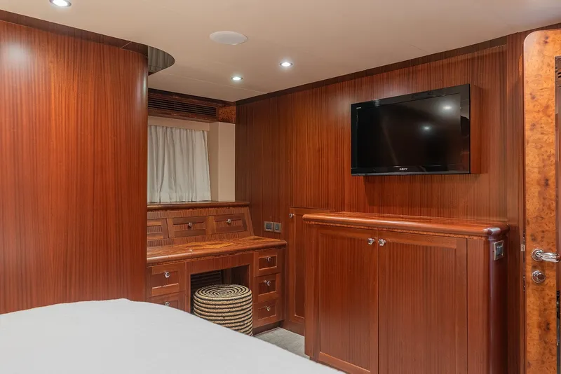 Slide: The Image of Luxurious wood-paneled cabin interior of 2013 Ocean Alexander 65 Pilothouse yacht. - 28