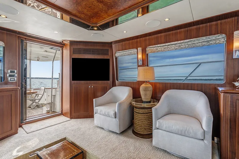 Slide: The Image of Luxurious interior of 2013 Ocean Alexander 65 Pilothouse yacht with elegant seating and ocean view. - 14