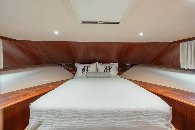 Slide: The Image of Luxurious bedroom interior of 2013 Ocean Alexander 65 Pilothouse yacht with elegant wood finish. - 33