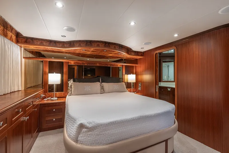 Slide: The Image of Luxurious bedroom interior of 2013 Ocean Alexander 65 Pilothouse yacht with elegant wood finishes. - 27
