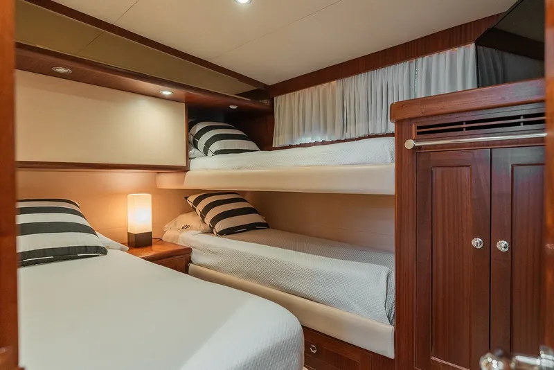 Slide: The Image of Luxurious cabin with bunk beds in 2013 Ocean Alexander 65 Pilothouse yacht. - 35