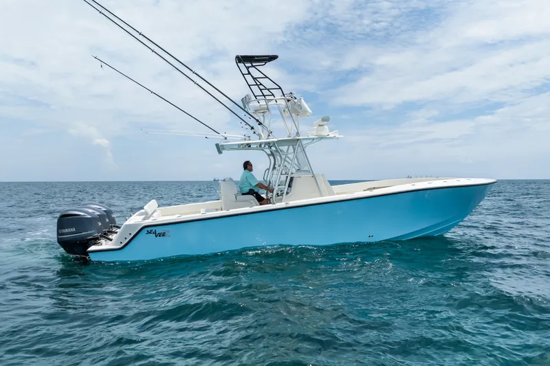 Slide: The Image of 2020 SeaVee 340Z boat on open ocean with clear skies. - 11
