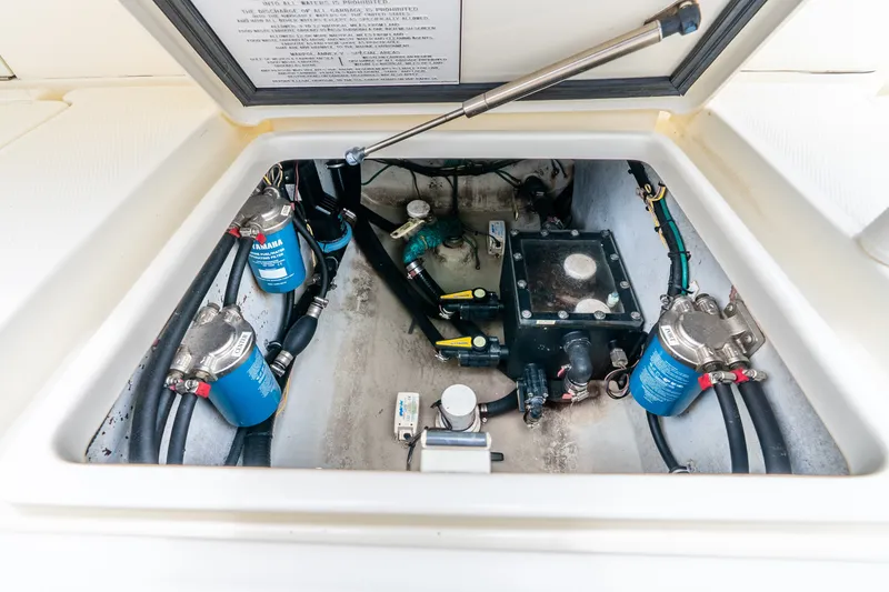 Slide: The Image of 2020 SeaVee 340Z engine compartment with Yamaha filters and mechanical components. - 37