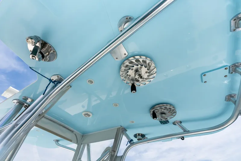 Slide: The Image of 2020 SeaVee 340Z boat's blue ceiling with metal fixtures and rods. - 52