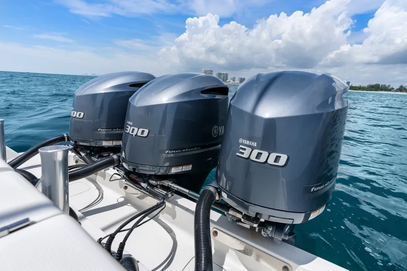 Slide: The Image of Triple Yamaha 300 engines on a 2020 SeaVee 340Z boat in open water. - 46