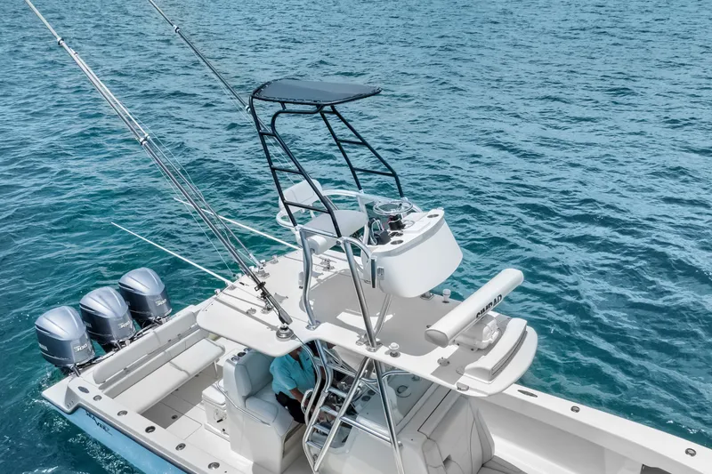 Slide: The Image of 2020 SeaVee 340Z boat with triple engines on open ocean. - 13