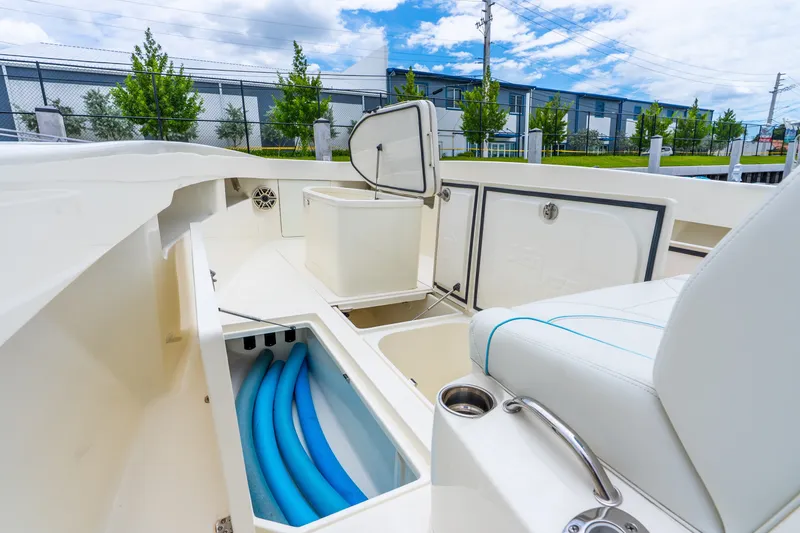 Slide: The Image of 2020 SeaVee 340Z boat interior with storage compartments and seating. - 35