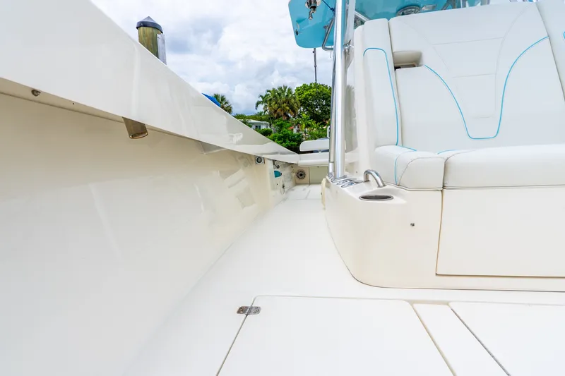 Slide: The Image of 2020 SeaVee 340Z boat interior with white seating and sleek design. - 33