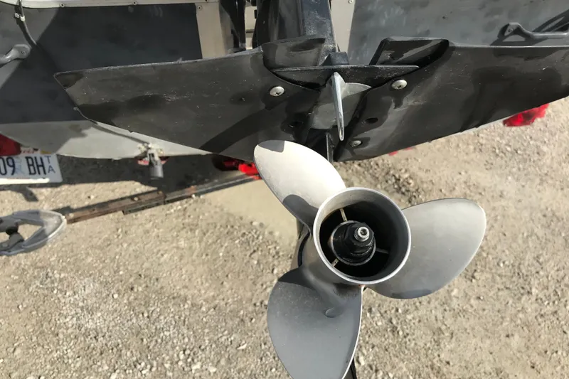 Slide: The Image of Propeller of a 1989 Lund 16 Pike SS boat on a trailer. - 26