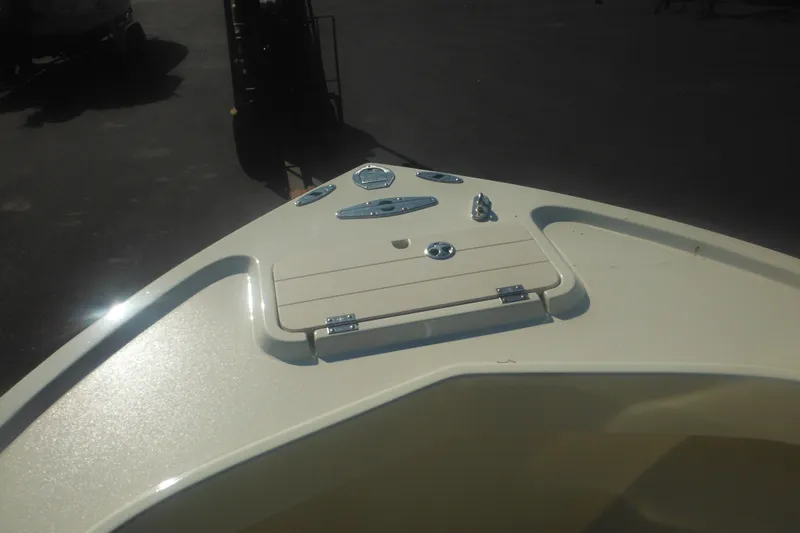 Slide: The Image of Bow of a 2001 Parker 1801 Center Console boat with storage compartment. - 14