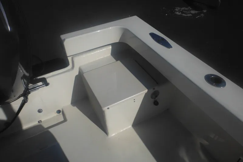 Slide: The Image of 2001 Parker 1801 Center Console boat interior with seating and rod holders. - 35