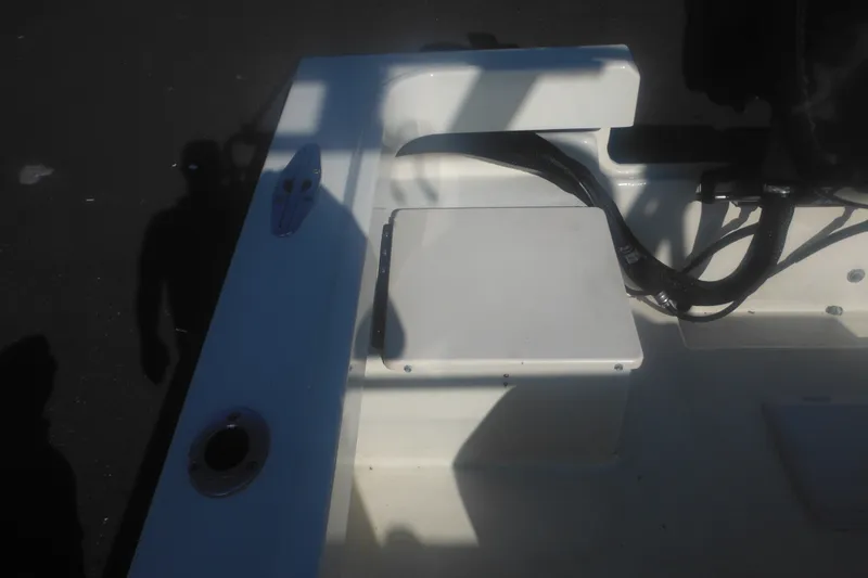 Slide: The Image of 2001 Parker 1801 Center Console boat interior with seating and storage area. - 37