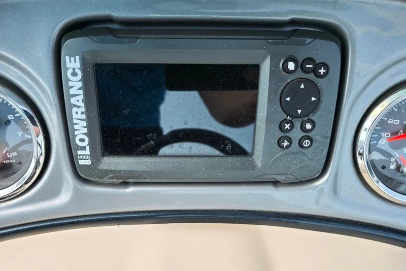 Slide: The Image of Lowrance fish finder on 2019 Sun Tracker Fishin' Barge 22 XP3 dashboard. - 15