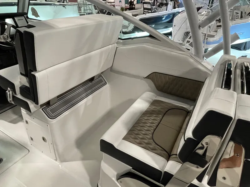 Slide: The Image of 2026 Blackfin 302 DC boat interior with luxurious seating and modern design. - 11