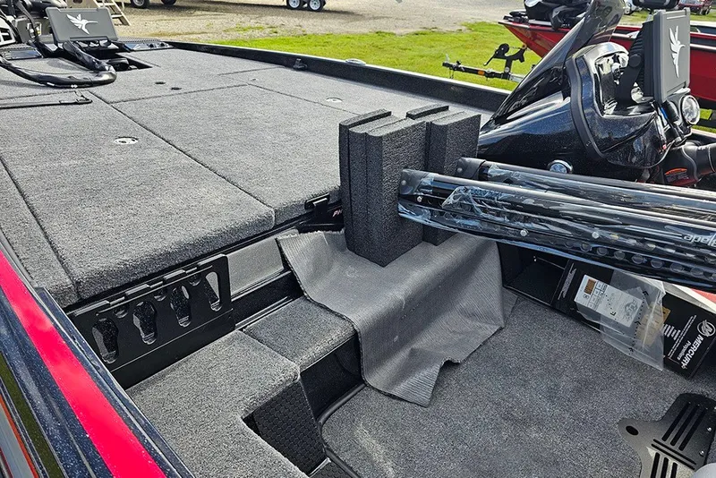 Slide: The Image of 2027 Phoenix 721 ZXL boat interior with carpeted deck and mounted equipment. - 15