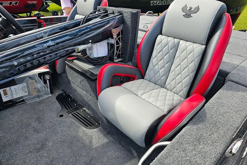 Slide: The Image of 2027 Phoenix 721 ZXL boat interior with gray and red quilted seat design. - 14