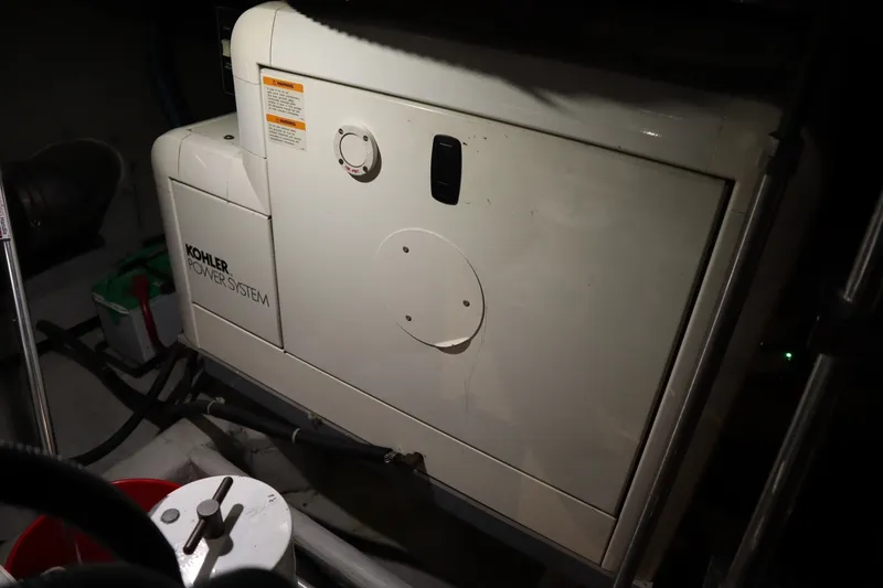 Slide: The Image of Kohler power system in 1999 Carver Yacht Voyager 530 engine room. - 42