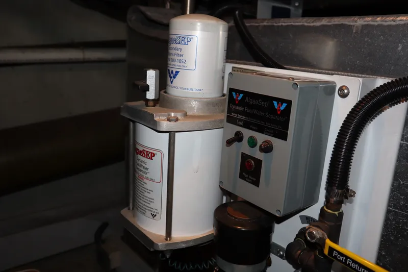 Slide: The Image of AlgaeSep fuel/water separator system in 1999 Carver Yacht Voyager 530 engine room. - 43
