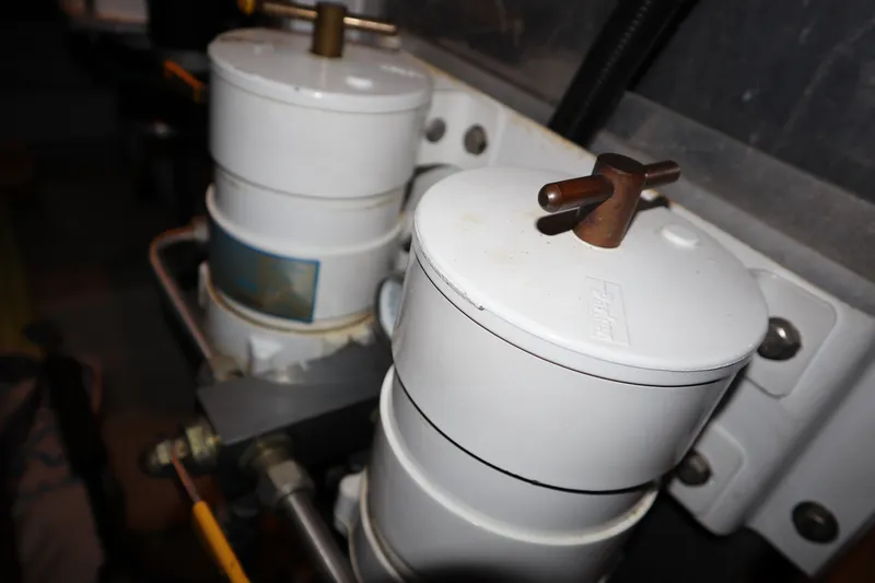 Slide: The Image of Fuel filters in the engine room of a 1999 Carver Yacht Voyager 530. - 44
