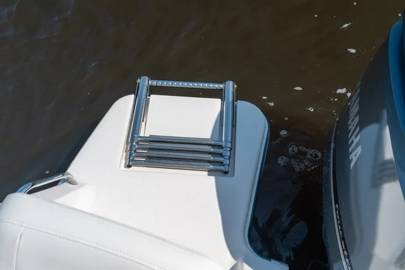 Slide: The Image of 2018 Grady-White Fisherman 216 boat with folded swim ladder and Yamaha engine. - 17