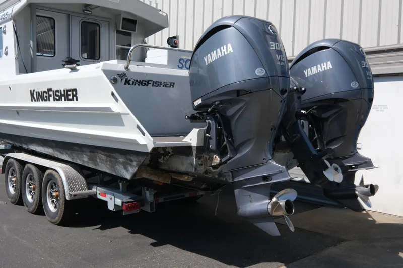 Slide: The Image of 2022 KingFisher 3425 GFX Offshore boat with dual Yamaha 300 V6 outboard engines. - 4