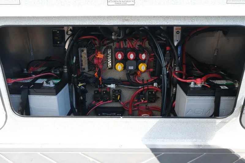Slide: The Image of Electrical system of 2022 KingFisher 3425 GFX Offshore boat, featuring batteries and wiring. - 24