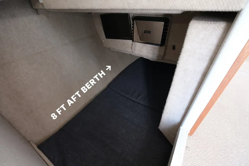 Slide: The Image of 8 ft aft berth in 2022 KingFisher 3425 GFX Offshore boat interior. - 19