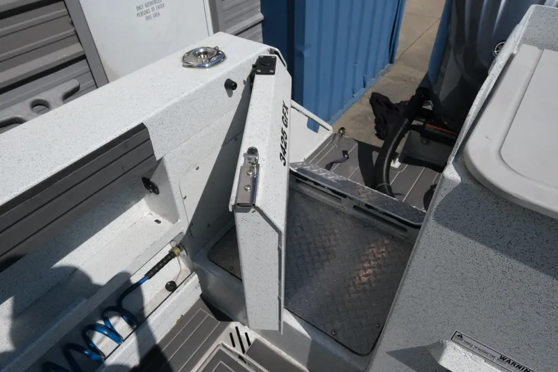 Slide: The Image of Interior view of a 2022 KingFisher 3425 GFX Offshore boat, showcasing deck details. - 20