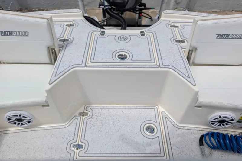 Slide: The Image of 2021 Pathfinder 2500 Hybrid boat deck with seating and storage compartments. - 50
