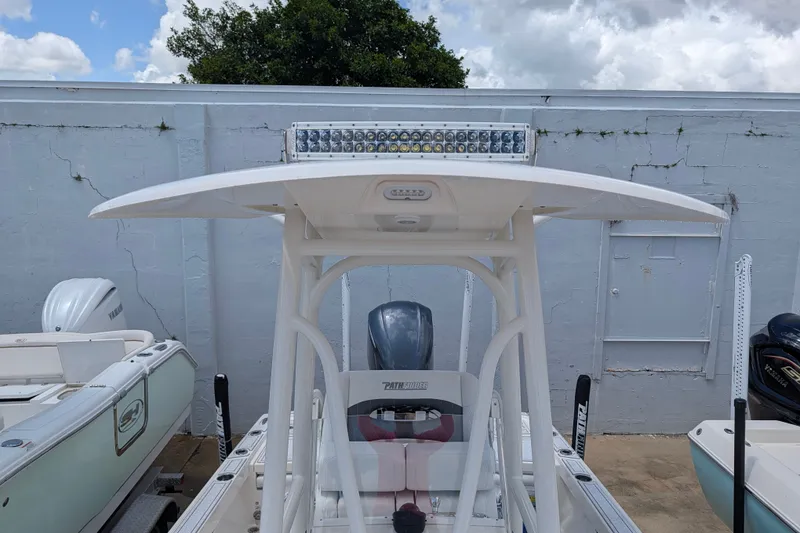 Slide: The Image of Pathfinder 2500 Hybrid boat, 2021 model, with T-top and LED light bar. - 48