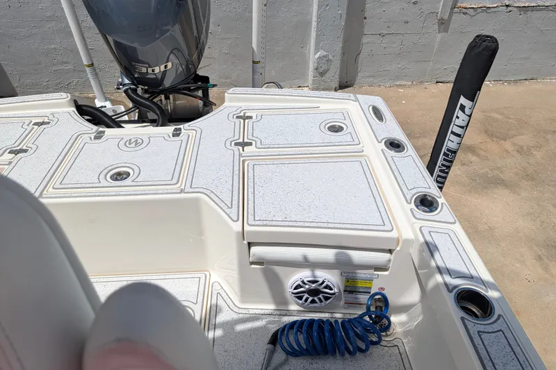 Slide: The Image of Pathfinder 2500 Hybrid 2021 boat deck with Yamaha 300 engine and speaker system. - 14