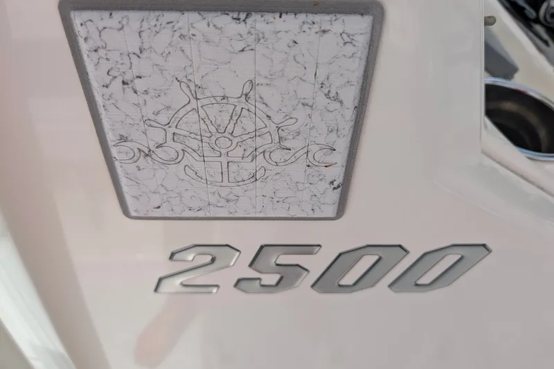Slide: The Image of Pathfinder 2500 Hybrid 2021 emblem with nautical wheel design. - 55
