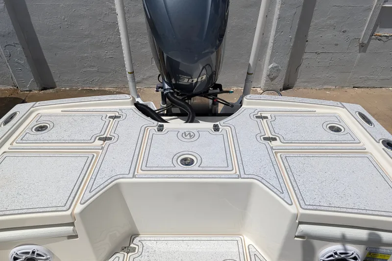 Slide: The Image of 2021 Pathfinder 2500 Hybrid boat with Yamaha engine, featuring spacious deck layout. - 13