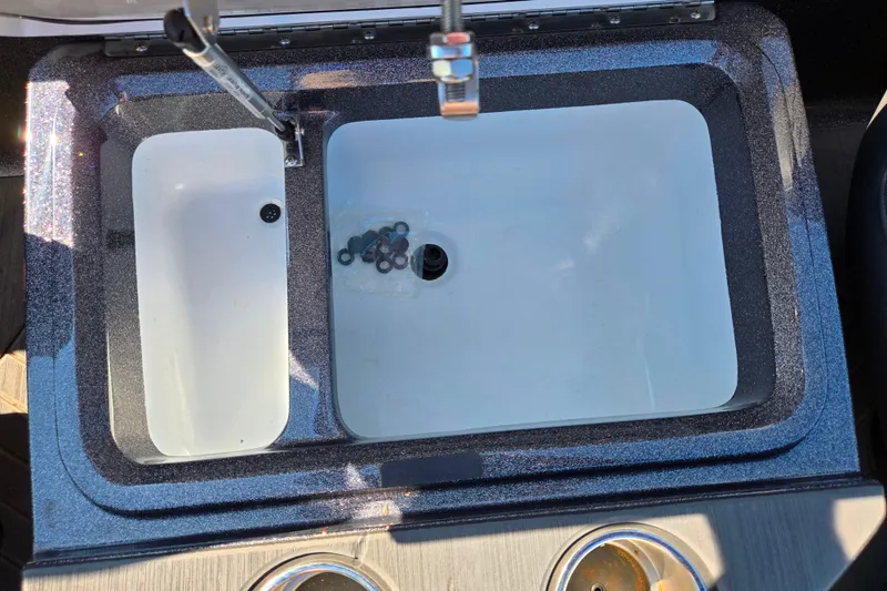 Slide: The Image of 2025 Vexus VX21 boat sink with dual basins and faucet, featuring a modern design. - 25