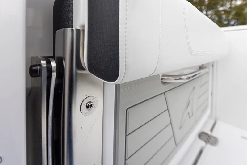 Slide: The Image of Close-up of 2024 Blackfin 272 DC boat seat and stainless steel hardware. - 27