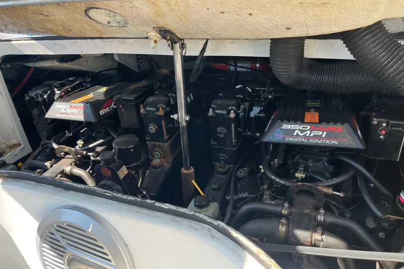 Slide: The Image of Engine compartment of a 1998 Sea Ray 280 Sun Sport with 350 MAG MPI engines. - 16