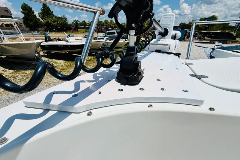 Slide: The Image of 2006 Glacier Bay 2670 Isle Runner boat deck with mounted equipment under a sunny sky. - 23