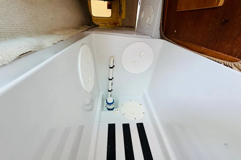 Slide: The Image of Interior view of a 2006 Glacier Bay 2670 Isle Runner boat compartment. - 26