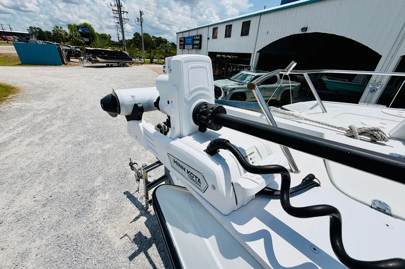 Slide: The Image of 2006 Glacier Bay 2670 Isle Runner with Minn Kota trolling motor at a boatyard. - 19