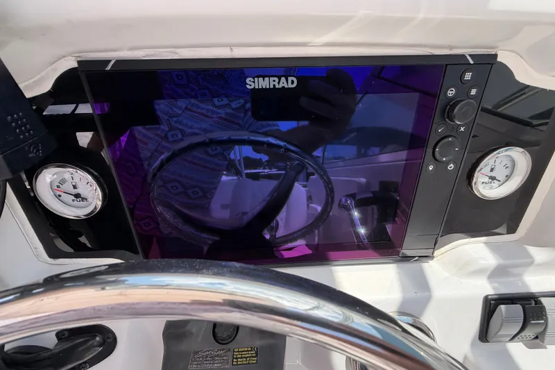 Slide: The Image of Boat dashboard with Simrad display on 2006 Glacier Bay 2670 Isle Runner. - 29