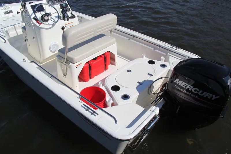 Slide: The Image of Manufacturer Provided Image: 2018 Boston Whaler 150 Montauk boat with Mercury engine on water. - 9